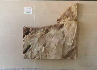 Réplicas de la Cueva de Maltravieso lucen en edificios de Cáceres